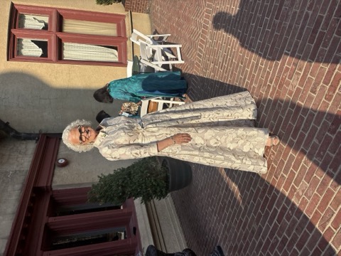Memoo in her gown at the June 2026 celebration